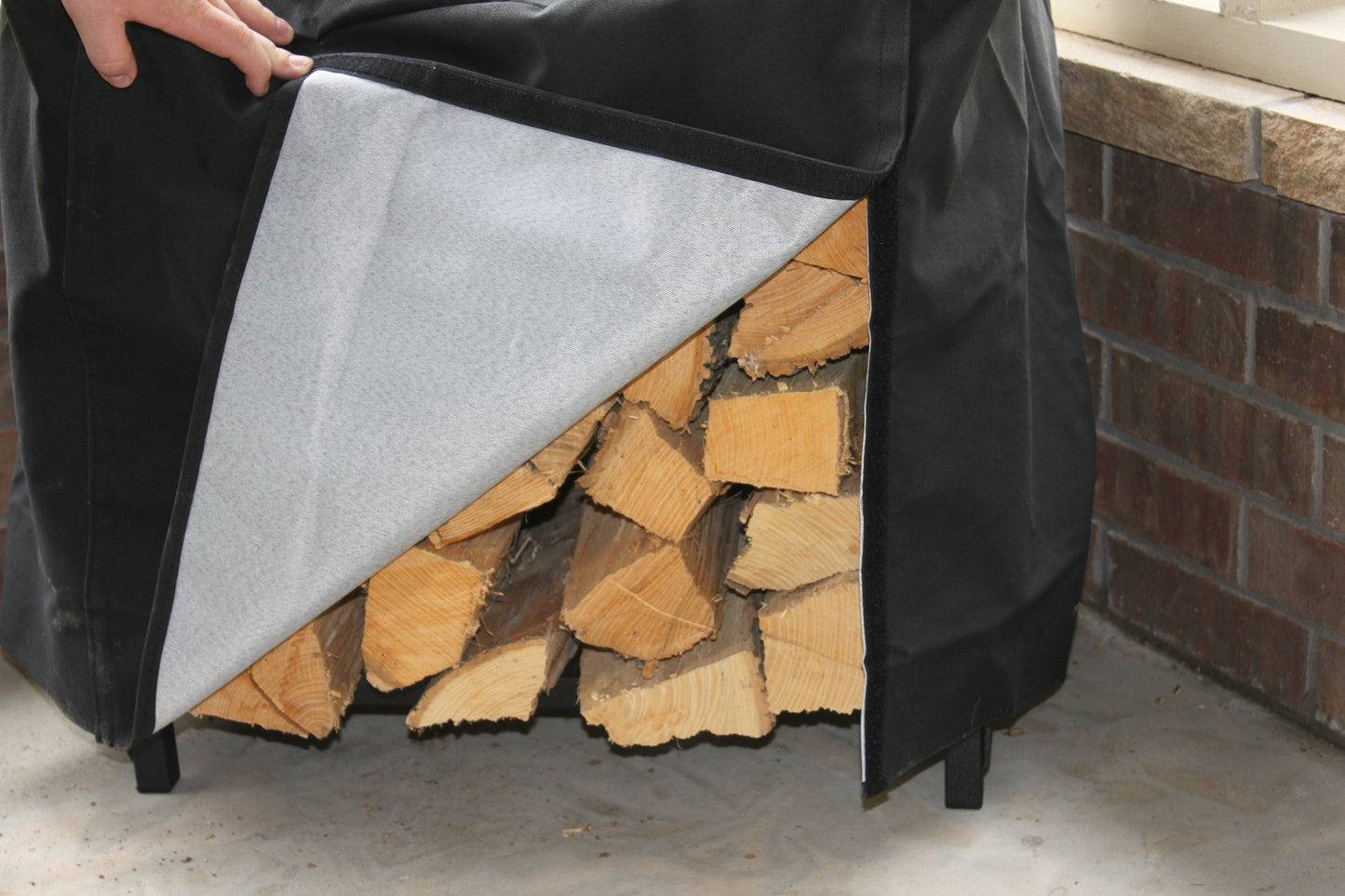 The Woodhaven 2ft Firewood Rack full black cover